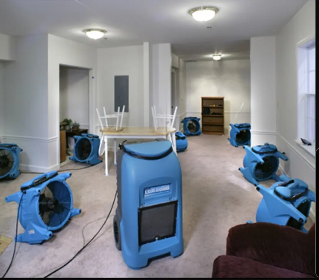 Air movers and dehumidifier setup for Water Damage Restoration in Sheridan